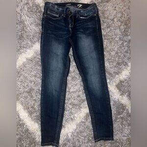 Blue Skinny Jeans with Tapered Legs and Faded Wash